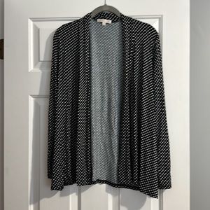 Cute stretchy black and white polka dot jacket.  Size M. G Collection.